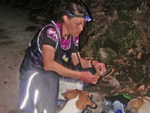 Jenny feeds our adopted dogs