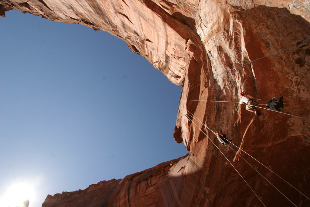 View of a team rappelling from below