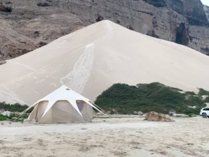 The Dragon's Nest tent set up on the beach