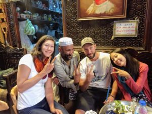 Matt, Tammy and Robyn pose with a local in a Hookah bar in Cairo